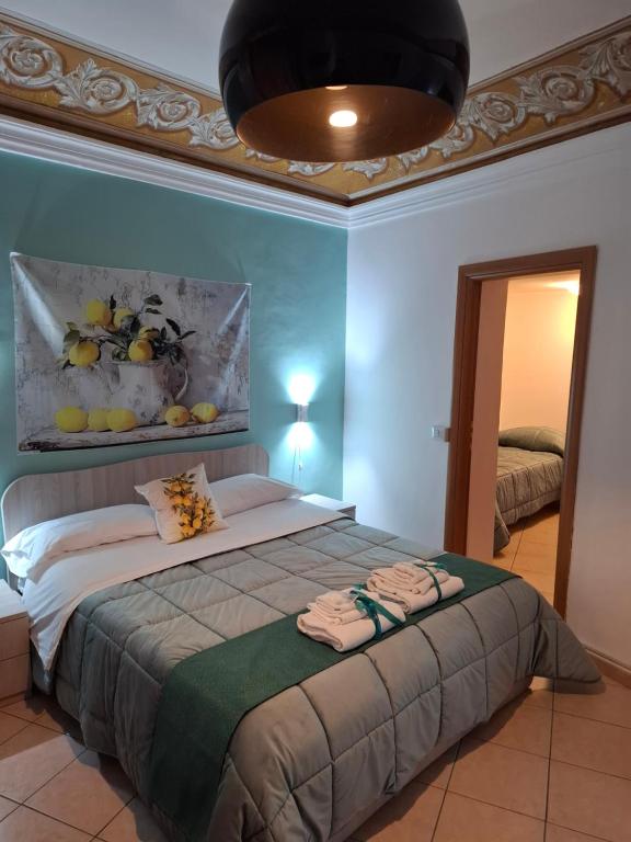 Postel nebo postele na pokoji v ubytování B&B Le Lumìe "Il Cortiletto Del Centro"