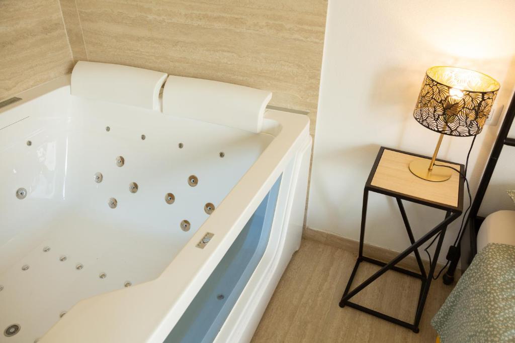 Fotografie z fotogalerie ubytování Maris Suite - Appartamento con vasca idromassaggio v destinaci Alghero