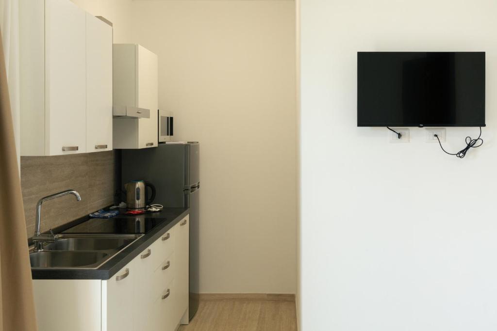 Kuchyň nebo kuchyňský kout v ubytování Maris Suite - Appartamento con vasca idromassaggio