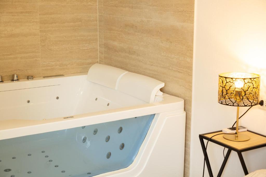 Fotografie z fotogalerie ubytování Maris Suite - Appartamento con vasca idromassaggio v destinaci Alghero