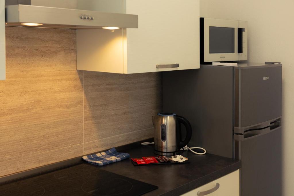 Kuchyň nebo kuchyňský kout v ubytování Maris Suite - Appartamento con vasca idromassaggio