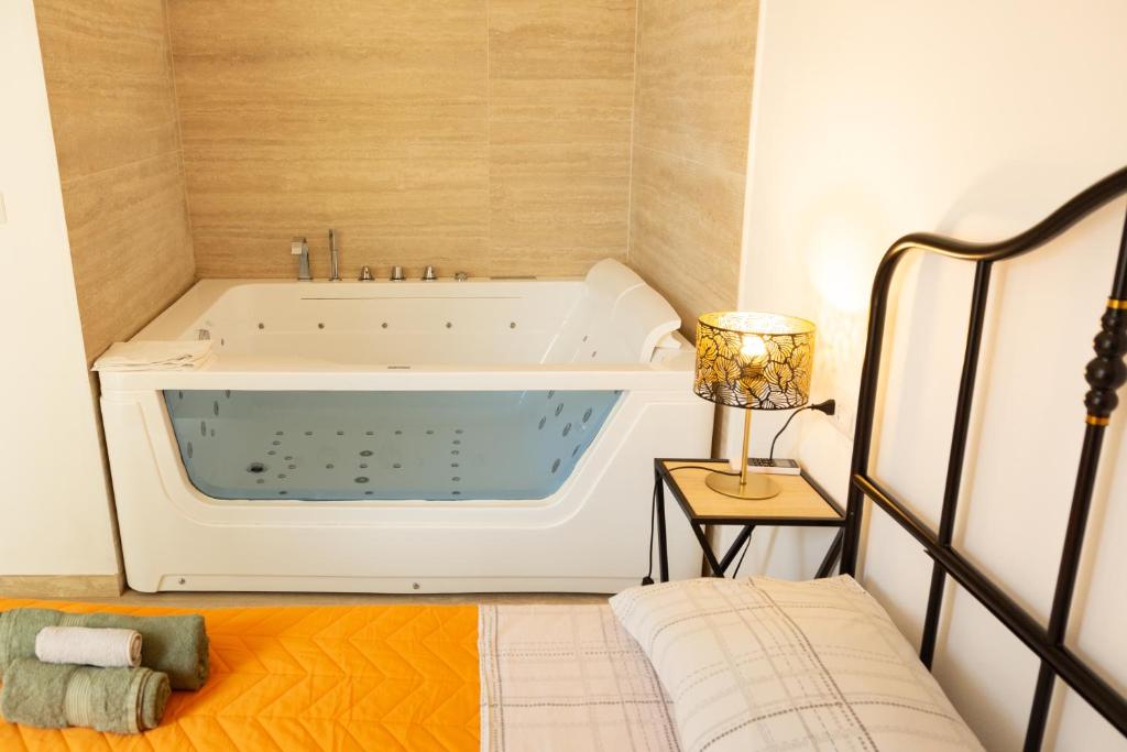 Fotografie z fotogalerie ubytování Maris Suite - Appartamento con vasca idromassaggio v destinaci Alghero