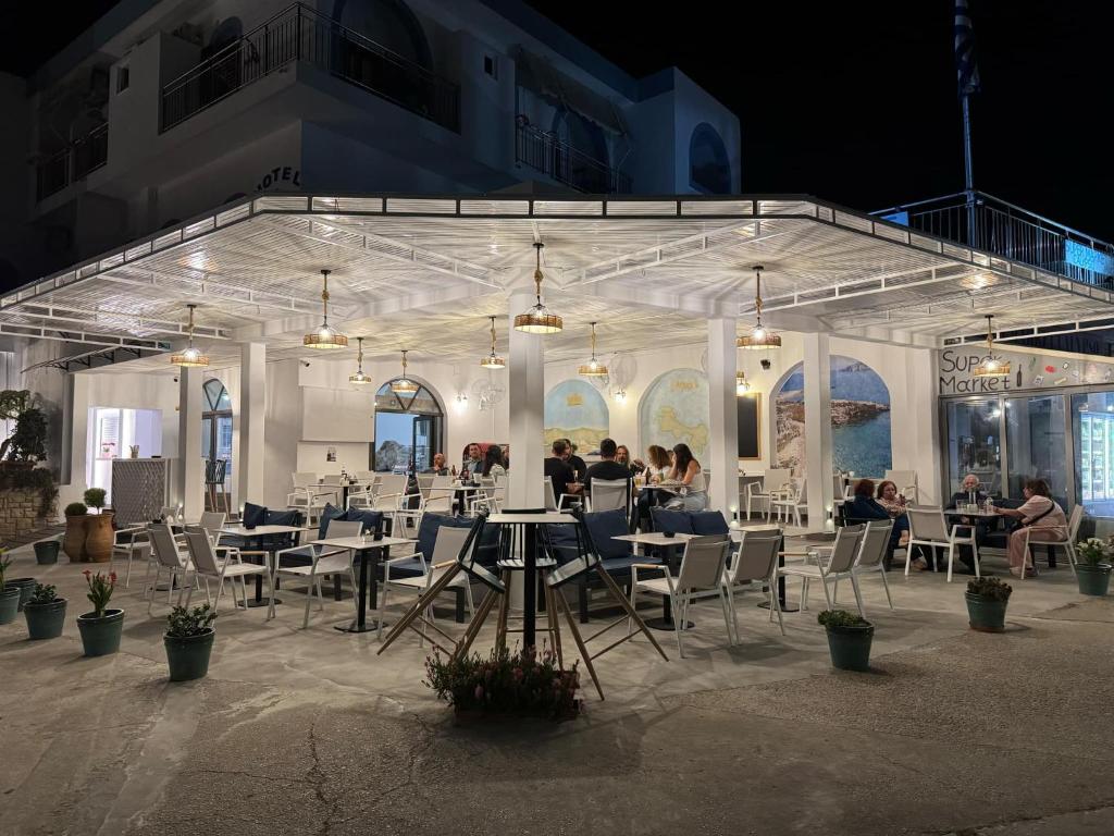 A restaurant or other place to eat at Calypso Hotel