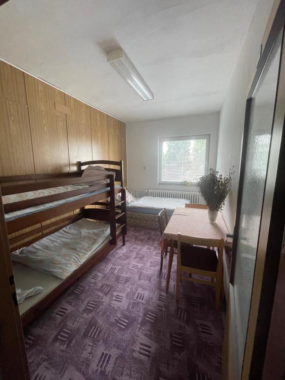 Postel nebo postele na pokoji v ubytování Apartmán u Vity