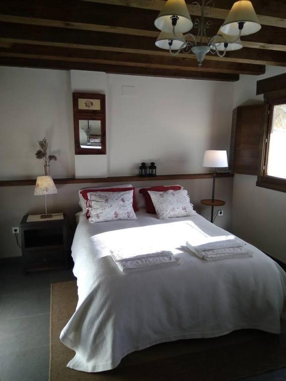 Posteľ alebo postele v izbe v ubytovaní El Hogar del Fresno casa con encanto en Cañicosa