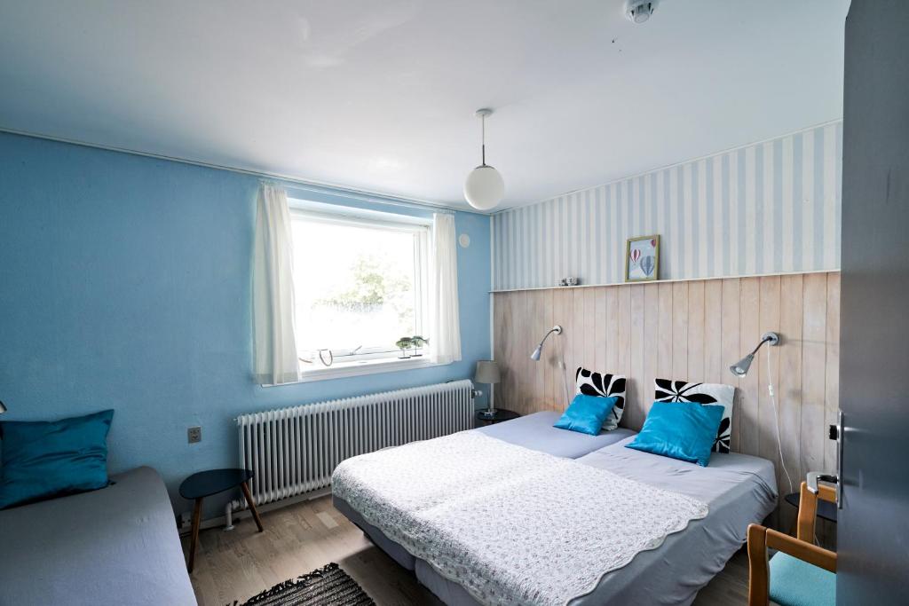 Postel nebo postele na pokoji v ubytování Hostel Agger Vandrerhjem