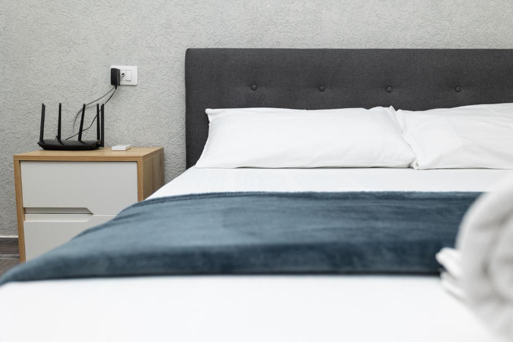 Letto o letti in una camera di Belka Studios
