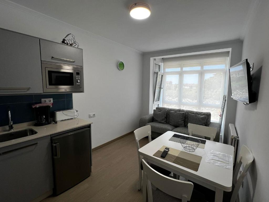 Kuchyňa alebo kuchynka v ubytovaní Apartamentos Pacheca