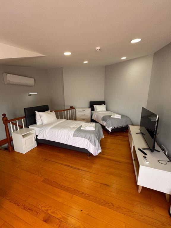 Postel nebo postele na pokoji v ubytování İstanbul Guesthouse