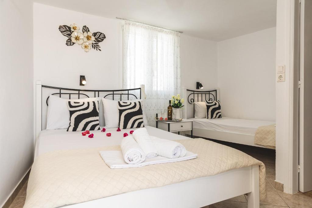 Postel nebo postele na pokoji v ubytování Rooms Maria