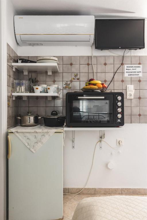 Kuchyň nebo kuchyňský kout v ubytování Rooms Maria