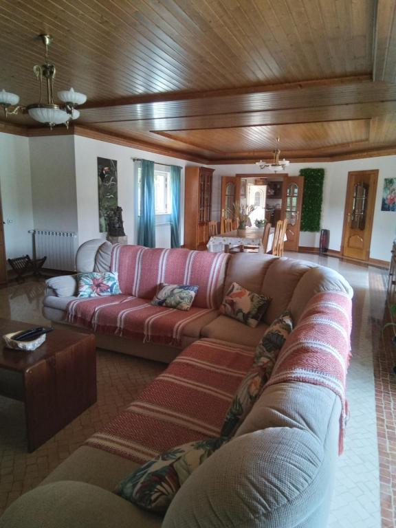 Uma área de estar em Casa das Laranjeiras