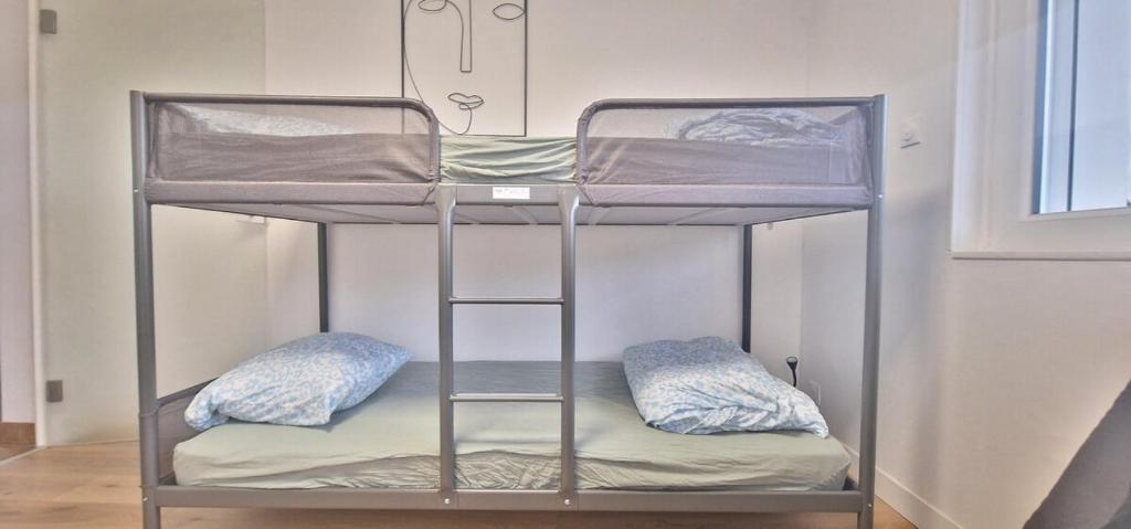 Posteľ alebo postele v izbe v ubytovaní Maison - terrasse - 2 chambres - Aurillac