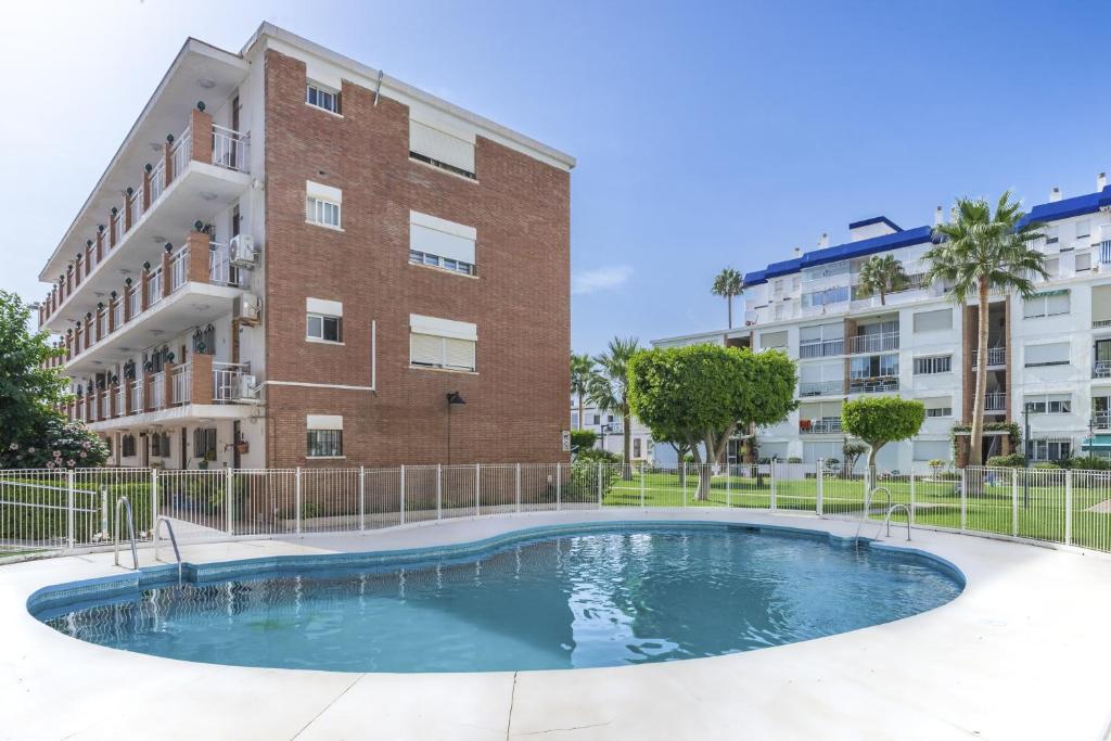 Bazén v ubytovaní White Summer in Benalmadena alebo v jeho blízkosti