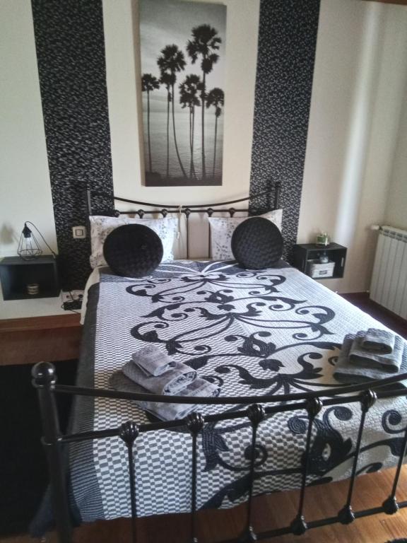 Uma cama ou camas num quarto em Casa das Laranjeiras