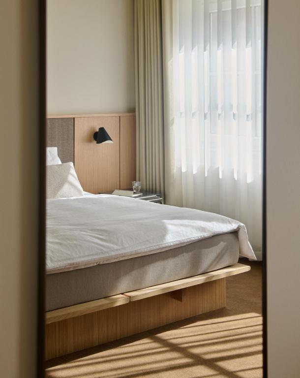 Postel nebo postele na pokoji v ubytování Hotel Petra