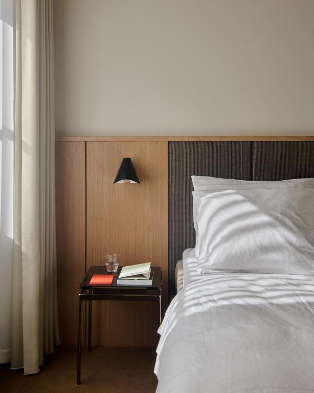 Postel nebo postele na pokoji v ubytování Hotel Petra