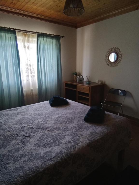 Uma cama ou camas num quarto em Casa das Laranjeiras
