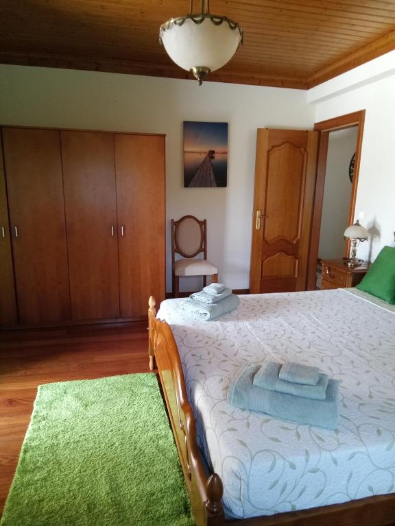Uma cama ou camas num quarto em Casa das Laranjeiras