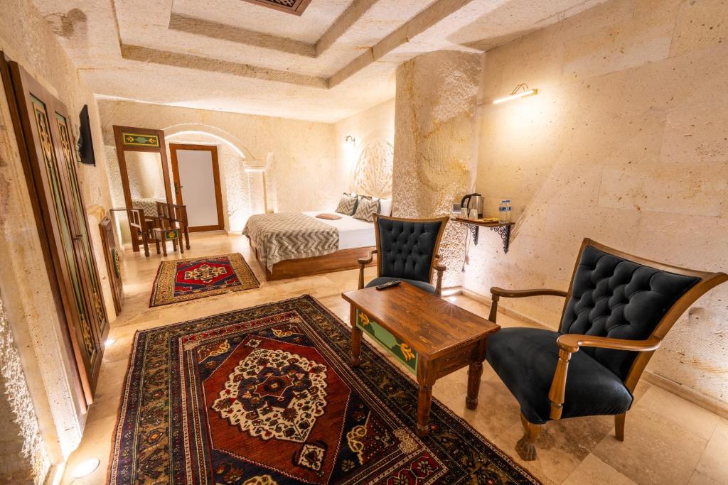 Postel nebo postele na pokoji v ubytování Cappadocia Sweet Cave