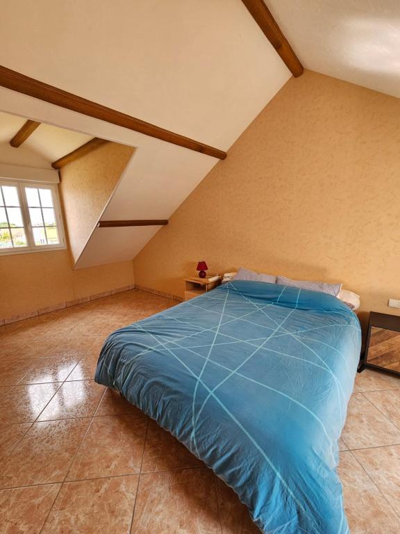 Postel nebo postele na pokoji v ubytování Maison Sérénité
