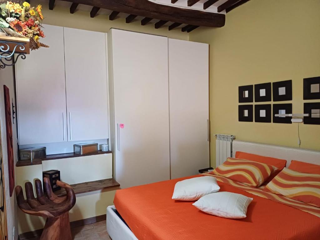 A bed or beds in a room at IL TROTTAPIANO HOME