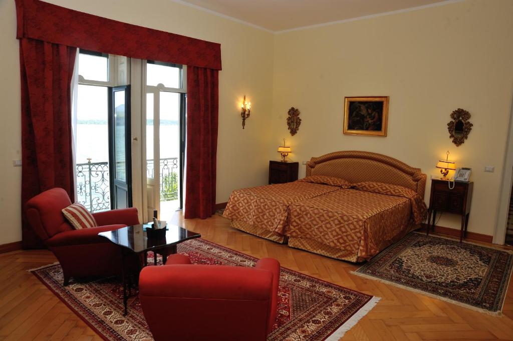 Postel nebo postele na pokoji v ubytování Villa Claudia dei Marchesi Dal Pozzo