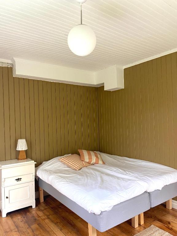 Postel nebo postele na pokoji v ubytování Karlbergs Pensionat