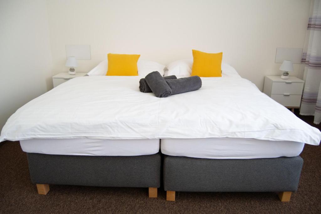 Postel nebo postele na pokoji v ubytování hotel Dobruška