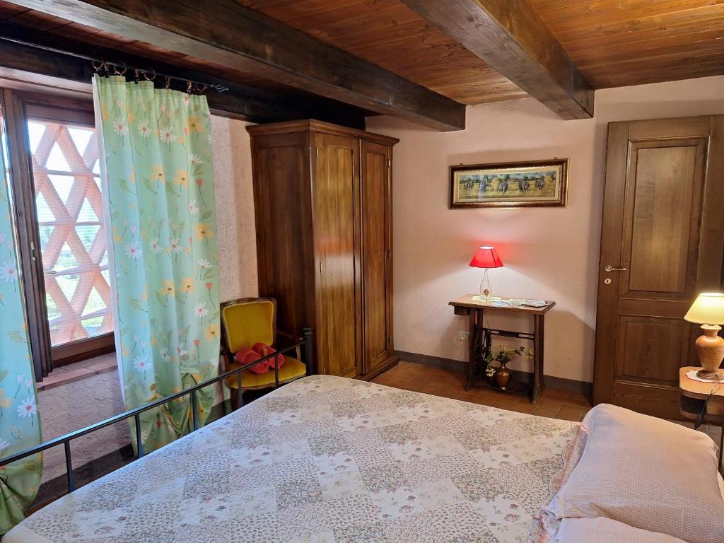 Posteľ alebo postele v izbe v ubytovaní Agriturismo Ristoro del Cavaliere