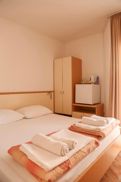 Postel nebo postele na pokoji v ubytování Villa Lasić Neum