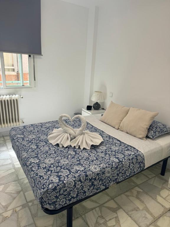 Ένα ή περισσότερα κρεβάτια σε δωμάτιο στο Habitacion valdemoro