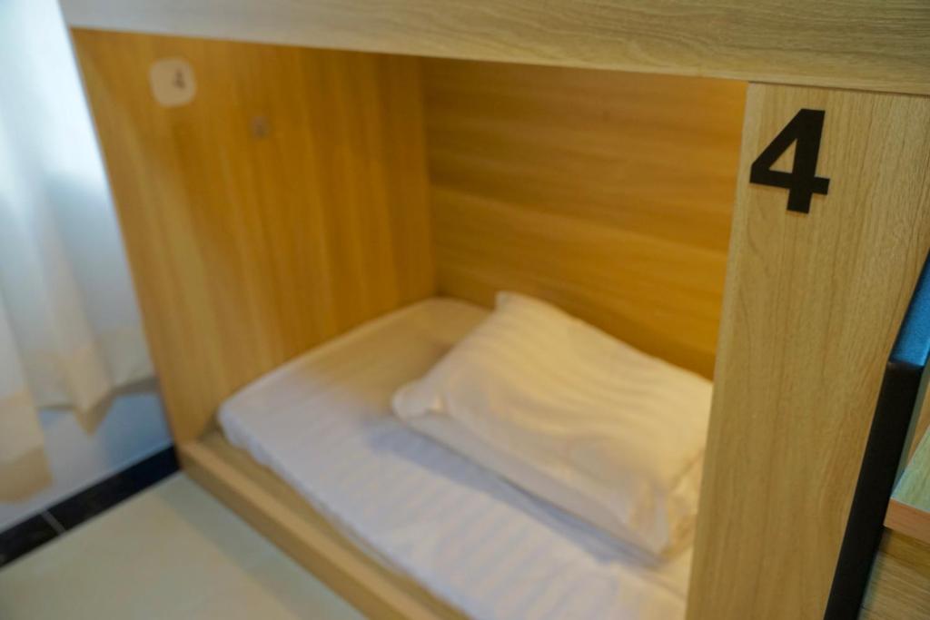 Letto o letti in una camera di Waveflo Hostel 浪花青旅