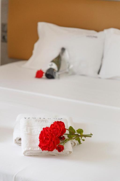 Postel nebo postele na pokoji v ubytování Vamvini Hotel