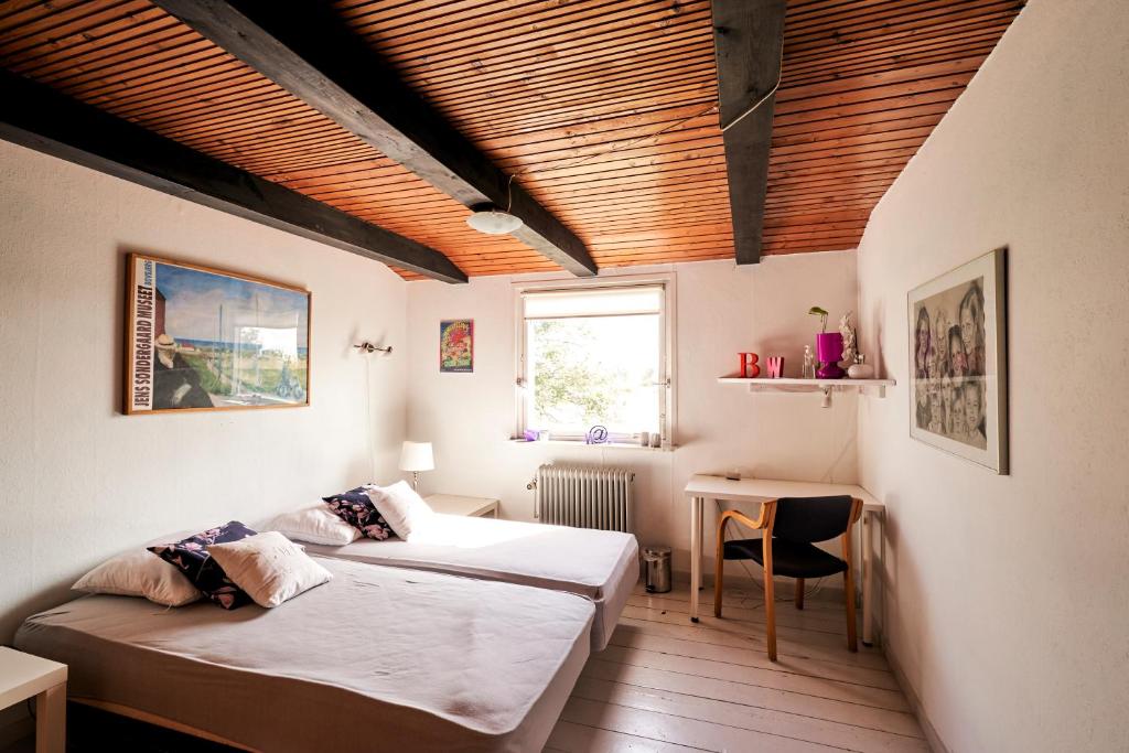 Postel nebo postele na pokoji v ubytování Hostel Agger Vandrerhjem