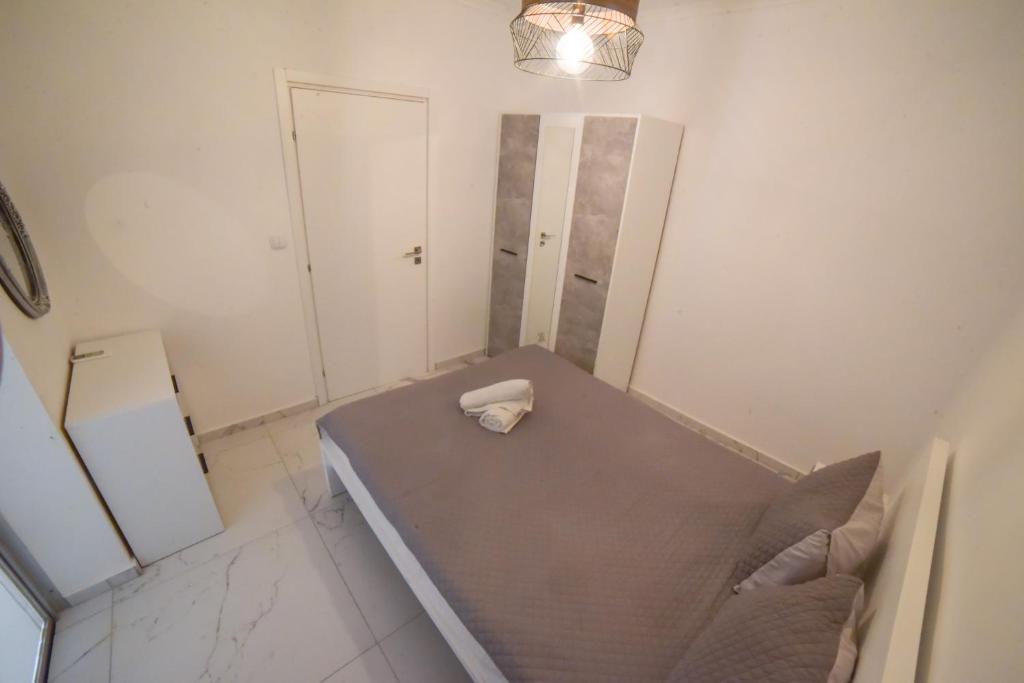 Postel nebo postele na pokoji v ubytování Zer, Nea Irakleia 630 80, Greece