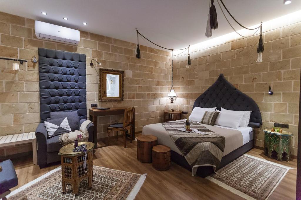 Postel nebo postele na pokoji v ubytování Utopia Luxury Suites - Old Town