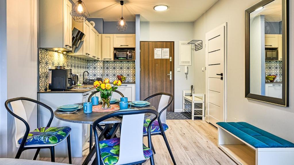 Kuchyňa alebo kuchynka v ubytovaní Apartament Szmaragdowy w Karpatia - 5D Apartamenty
