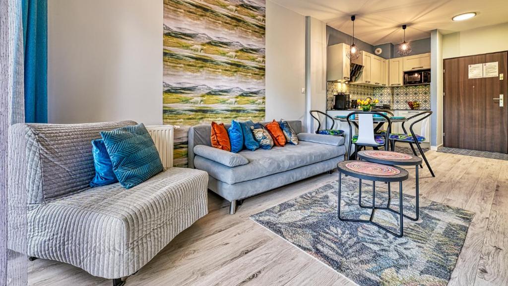 Posedenie v ubytovaní Apartament Szmaragdowy w Karpatia - 5D Apartamenty