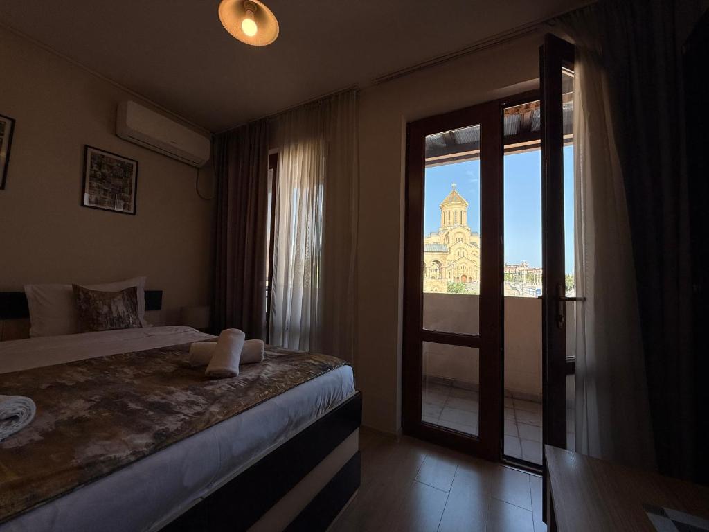 Postel nebo postele na pokoji v ubytování Liva Hotel