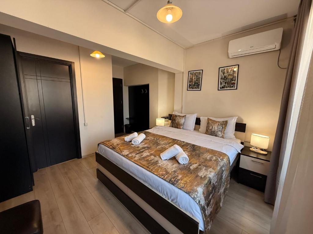 Postel nebo postele na pokoji v ubytování Liva Hotel