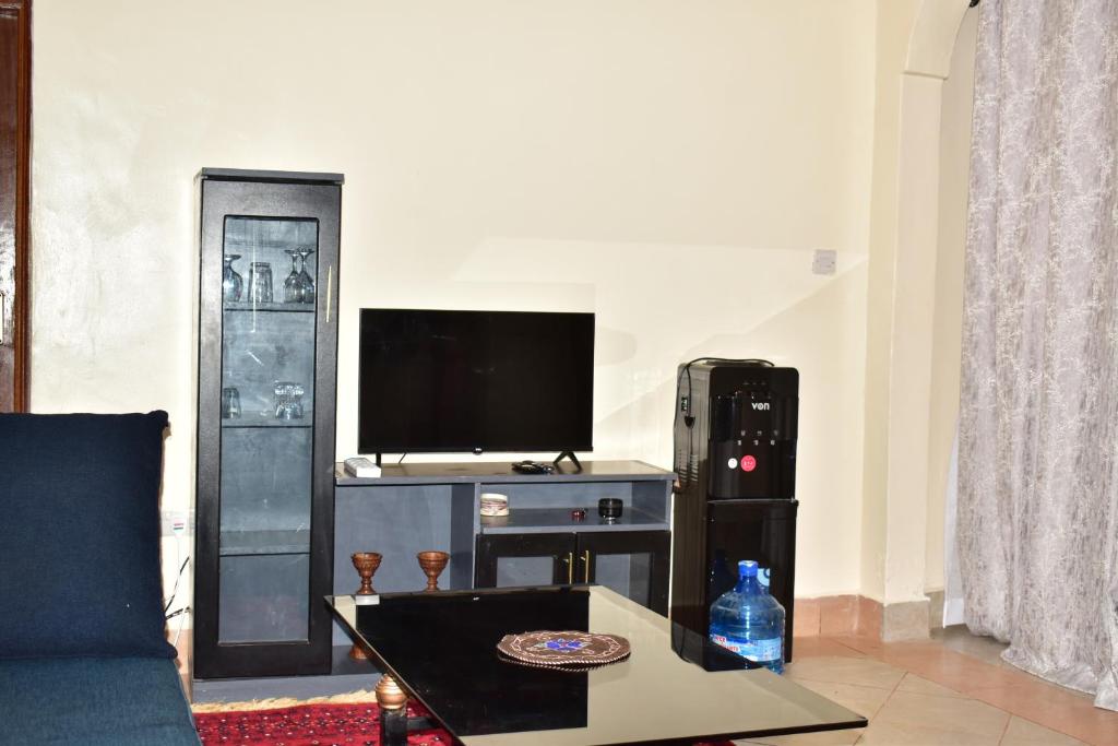 TV a/nebo společenská místnost v ubytování Kukis Place in Embu