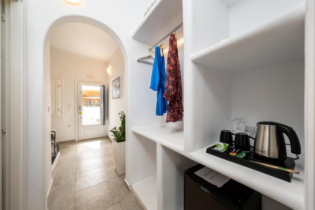 Kuchyň nebo kuchyňský kout v ubytování Amaze Suites