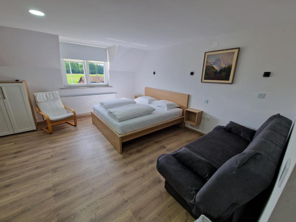Postel nebo postele na pokoji v ubytování Dežman Apartments & Rooms