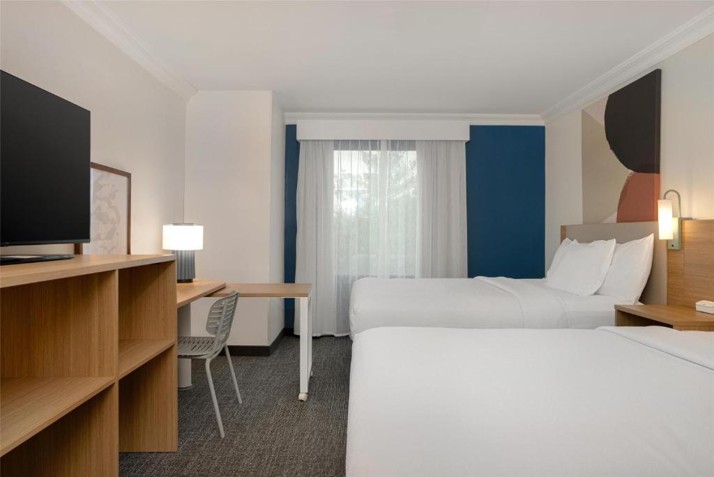 Postel nebo postele na pokoji v ubytování Spark by Hilton Rahway