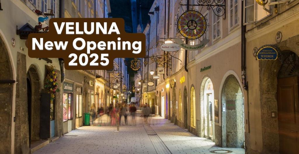 a street with a sign that reads vienna new opening at VELUNA Salzburg One in Salzburg