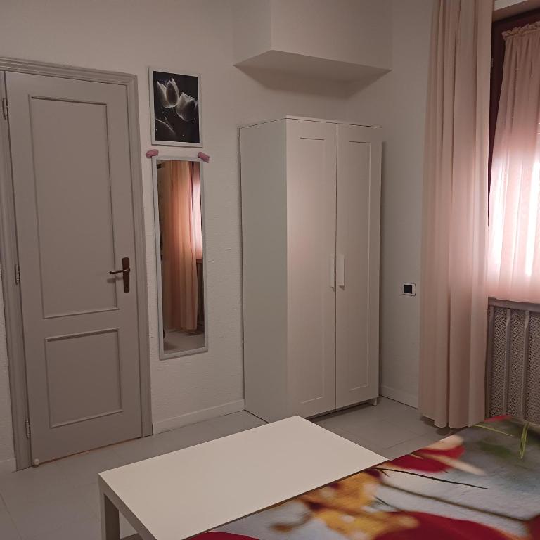 Postel nebo postele na pokoji v ubytování Affittacamere Il Conte