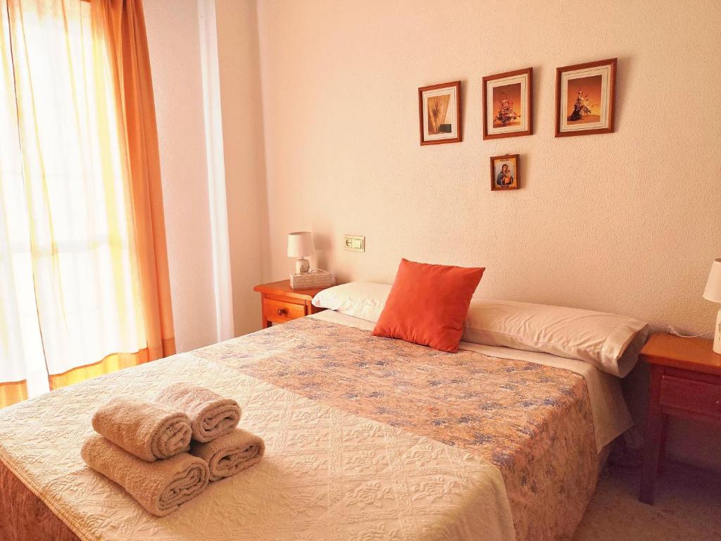 Łóżko lub łóżka w pokoju w obiekcie Top Rota Playa La Costilla Costa de la Luz