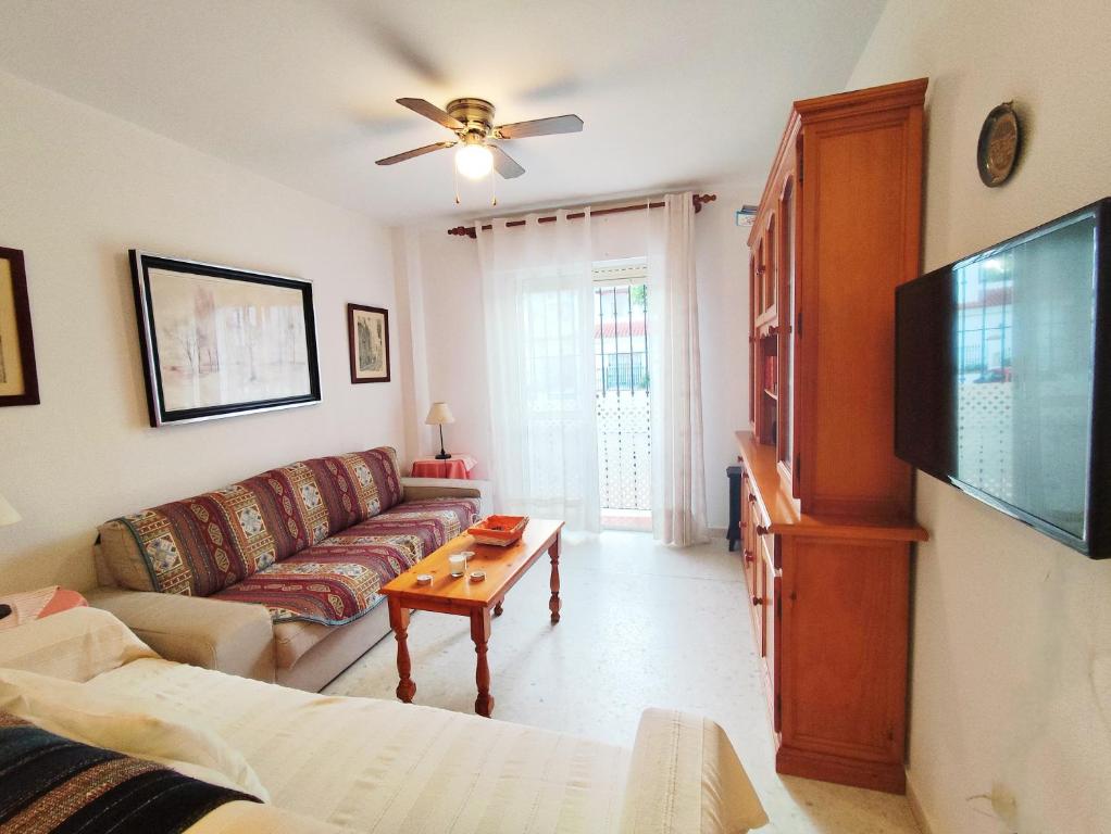 Telewizja i/lub zestaw kina domowego w obiekcie Top Rota Playa La Costilla Costa de la Luz