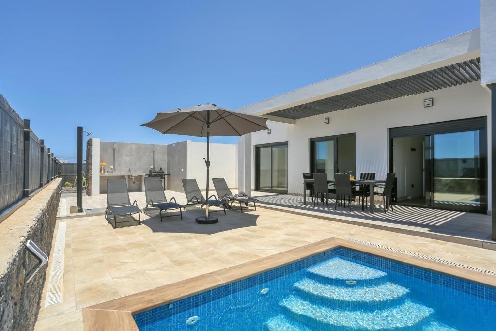 Πισίνα στο ή κοντά στο Villa Dorada del Roque